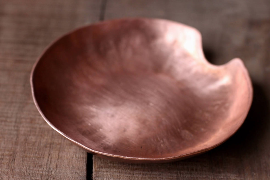 a blacksmith hand forged copper spoon by Wicks Forge
