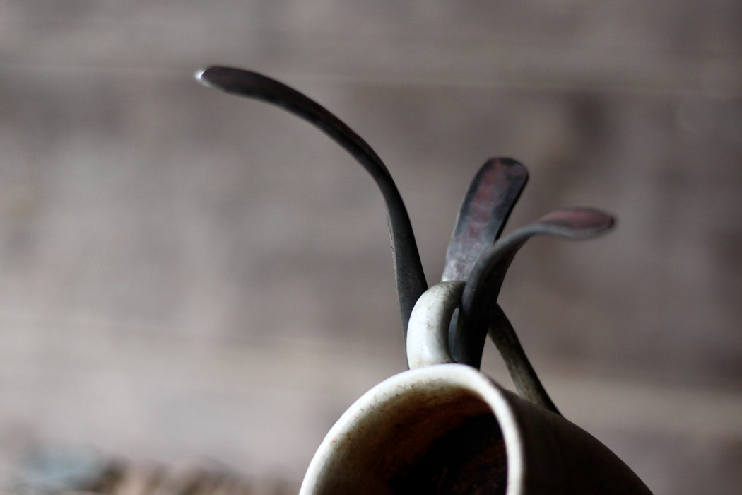 a blacksmith hand forged coffee mug and tea cup display tree by Wicks Forge