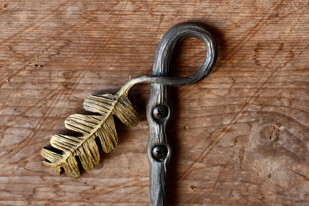 a blacksmith hand forged oak leaf hook from the Wicks Forge Limited Series