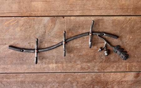 a blacksmith hand forged oak tree coat rack by Wicks Forge