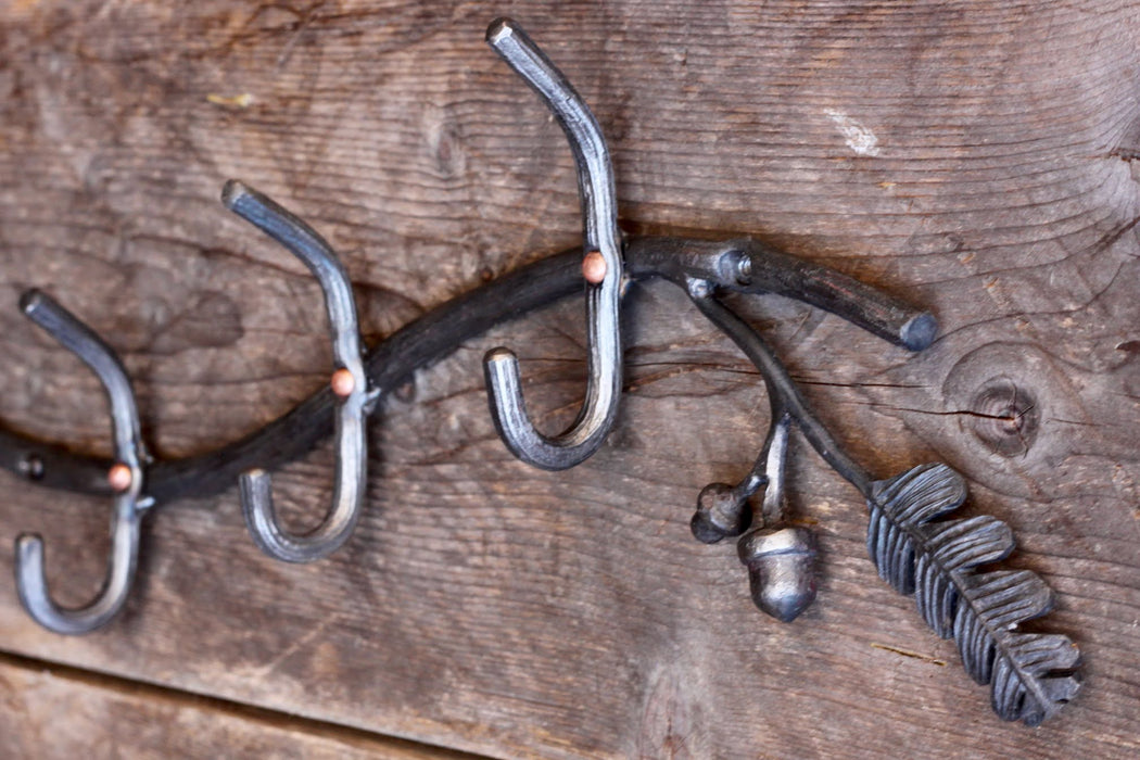 a blacksmith hand forged oak tree coat rack by Wicks Forge