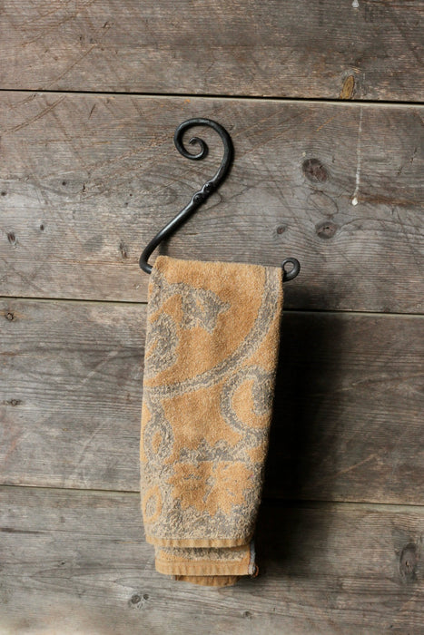 a blacksmith hand forged scrolled towel rack by Wicks Forge