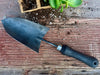 black hand spade made of iron with a wooden handle by wicks forge 