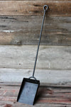 shovel against a wooden wall by wicks forge 