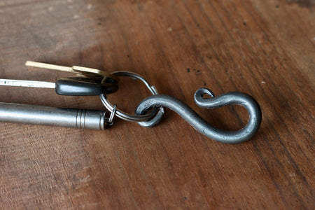 a blacksmith hand forged belt-loop keychain by Wicks Forge