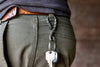 a blacksmith hand forged belt loop keychain with a twist design by Wicks Forge