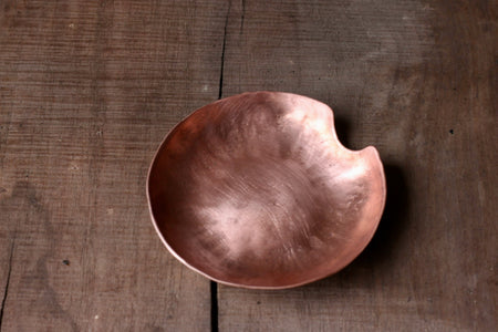 a blacksmith hand forged copper spoon rest by Wicks Forge
