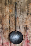 a blacksmith hand forged camping cooking pan by Wicks Forge