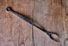 A blacksmith hand forged BBQ Fork with a circle handle by Wicks Forge