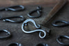 a blacksmith hand forged bottle opener by Wicks Forge