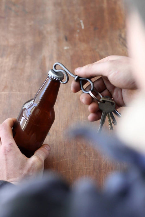a blacksmith hand forged bottle opener by Wicks Forge