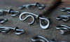 a blacksmith hand forged bottle opener by Wicks Forge