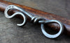 a blacksmith hand forged bottle opener by Wicks Forge