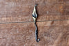 a blacksmith hand forged hook with a Calla Lily Flower detail by Wicks Forge