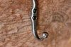 a blacksmith hand forged hook with a Calla Lily Flower detail by Wicks Forge