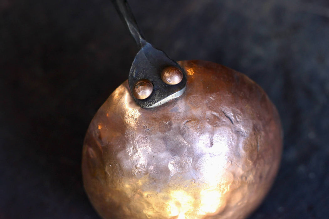 back view of the ladle's copper dish with copper rivets by Wicks Forge