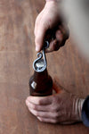 a personalized blacksmith hand forged bottle opener by Wicks Forge