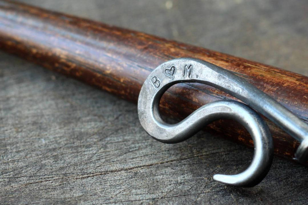 a personalized blacksmith hand forged bottle opener by Wicks Forge
