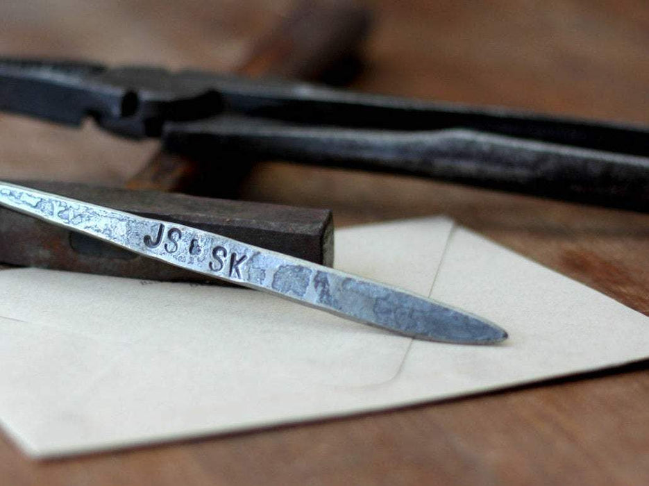 a blacksmith hand forged leaf letter opener by Wicks Forge