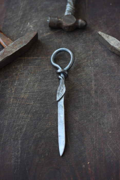 a blacksmith hand forged leaf letter opener by Wicks Forge