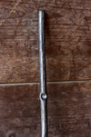 a blacksmith hand forged fire stick style fire poker by Wicks Forge