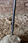 a blacksmith hand forged fire stick style fire poker by Wicks Forge