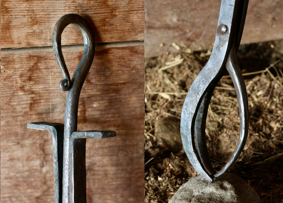 a blacksmith hand forged log grabber by Wicks Forge