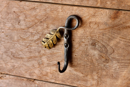 a blacksmith hand forged oak leaf hook from the Wicks Forge Limited Series