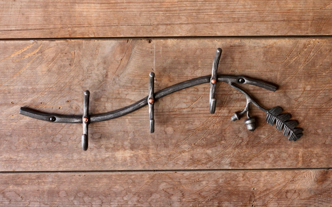 a blacksmith hand forged oak tree coat rack by Wicks Forge