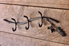 a blacksmith hand forged oak tree coat rack by Wicks Forge