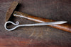 a blacksmith hand forged letter opener with a reverse curl handle by Wicks Forge