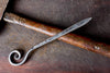 a blacksmith hand forged personalized letter opener with a spiral scroll handle by Wicks Forge