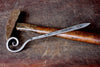 a blacksmith hand forged letter opener with a spiral scroll handle by Wicks Forge