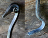 a blacksmith hand forged fire poker with a ram's head detail by Wicks Forge
