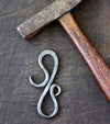 a blacksmith hand forged small keychain bottle opener by Wicks Forge