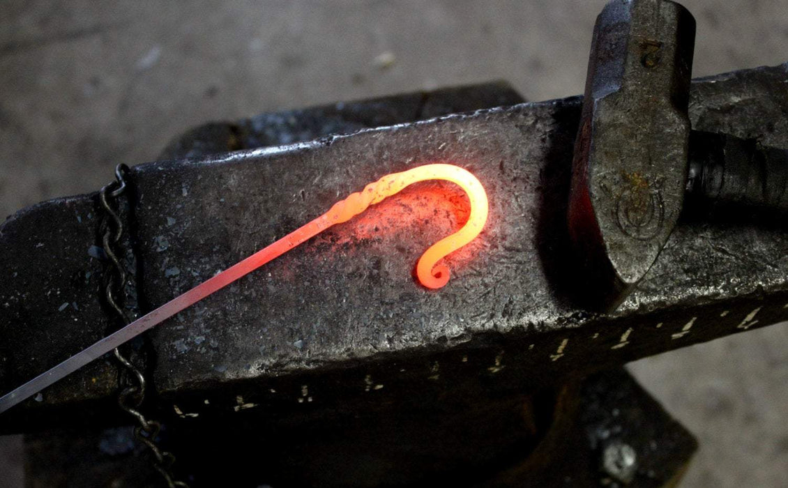 a blacksmith hand forged wall hook with a twist detail by Wicks Forge