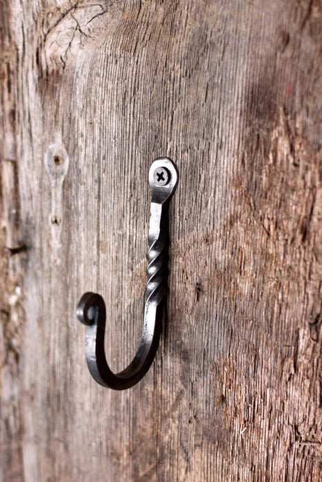 a blacksmith hand forged wall hook with a twist detail by Wicks Forge